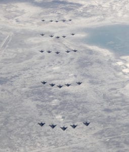 Twenty five F-117 Nighthawk stealth fighters fly over New Mexico as part of the 25th Anniversary celebration at Holloman Air Force Base, NM. (U.S. Air Force photo)